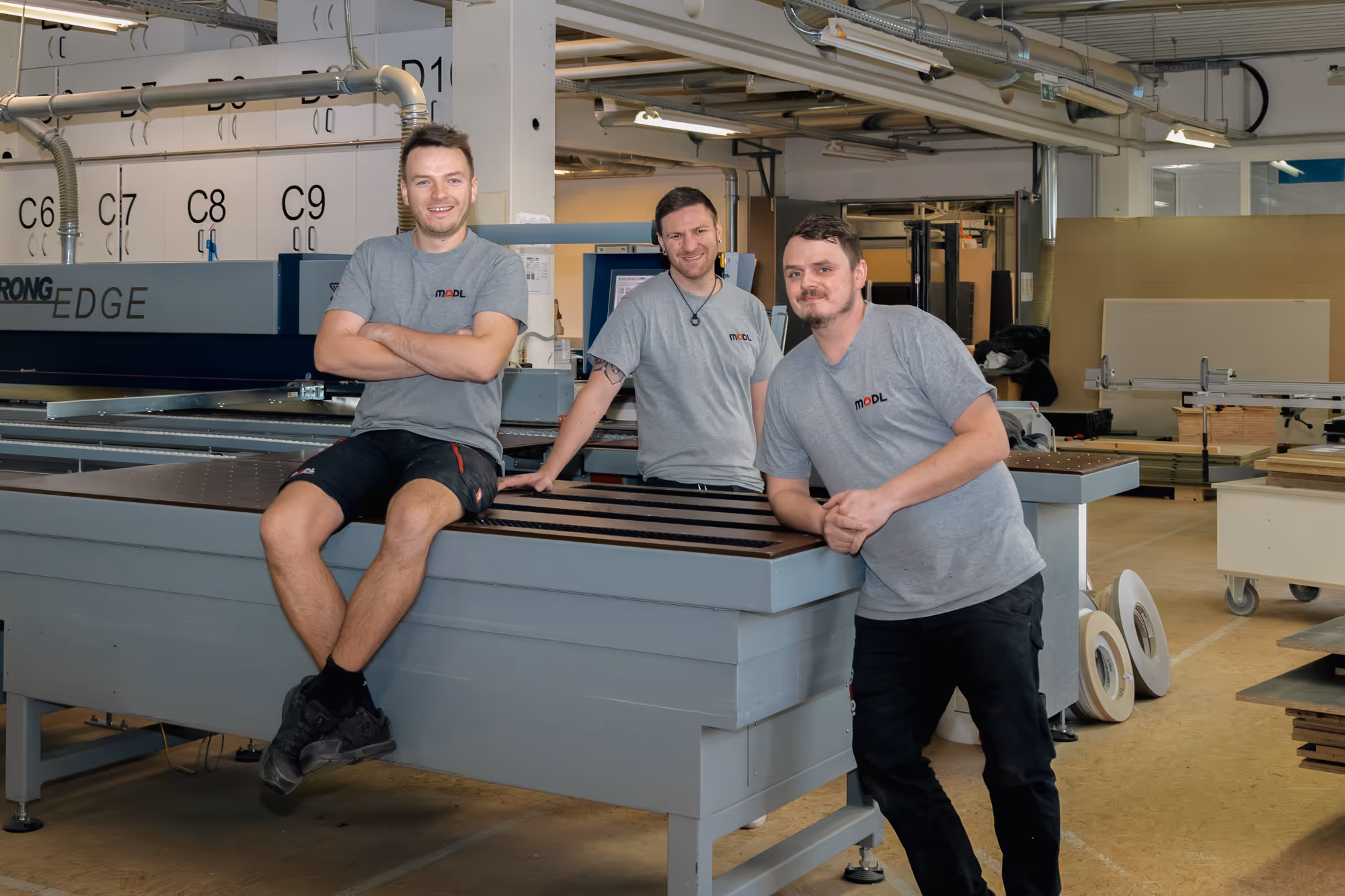 4 Personen in einer Werkstat