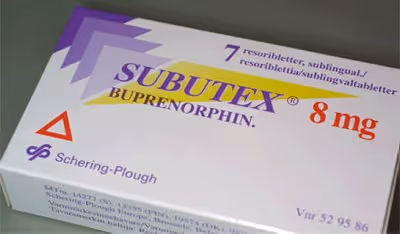 Photograph of a Subutex (buprenorphine) medication box labelled '7 resoribletter, sublingual', '8 mg' and 'SUBUTEX Buprenorphin', made by Schering-Plough.
