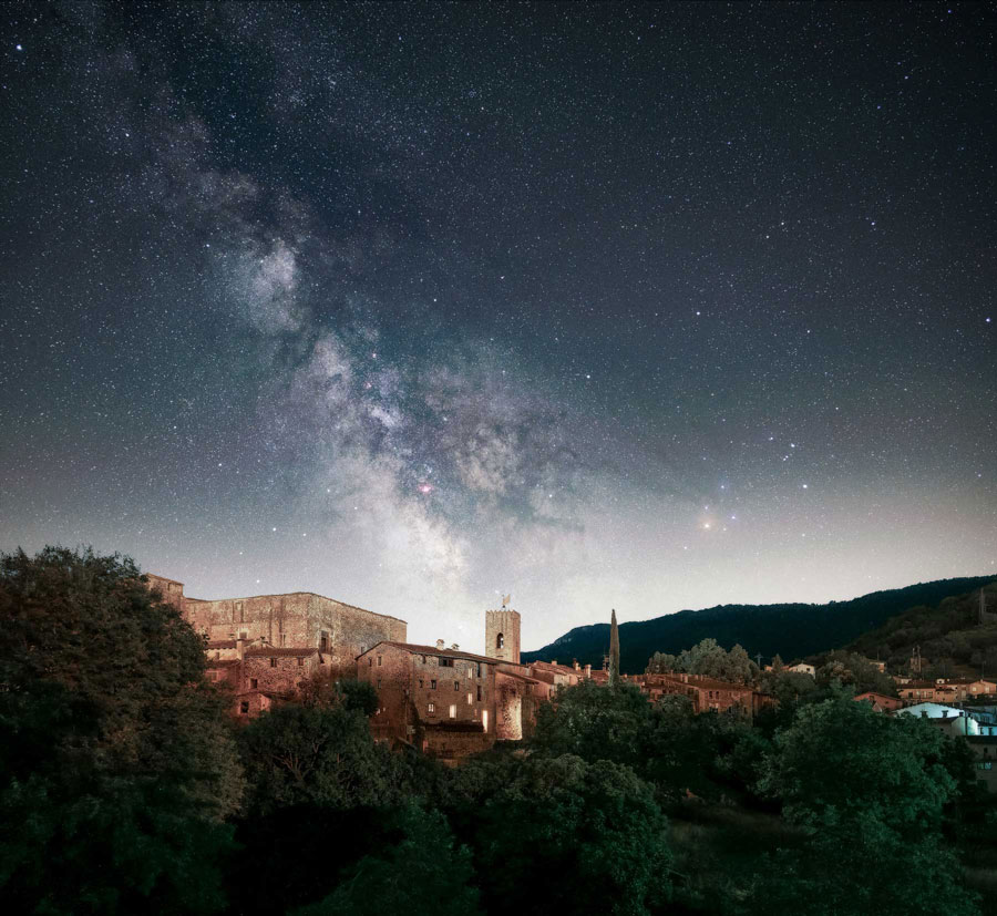 Night photograph of a Spanish castle with a beautiful starry sky