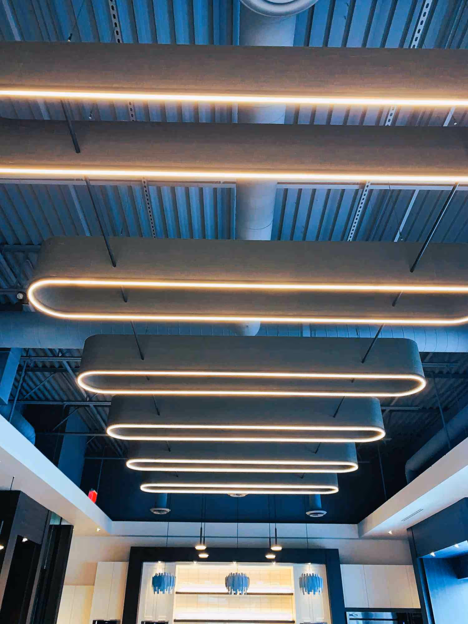 Hanging luminaires in a breakroom