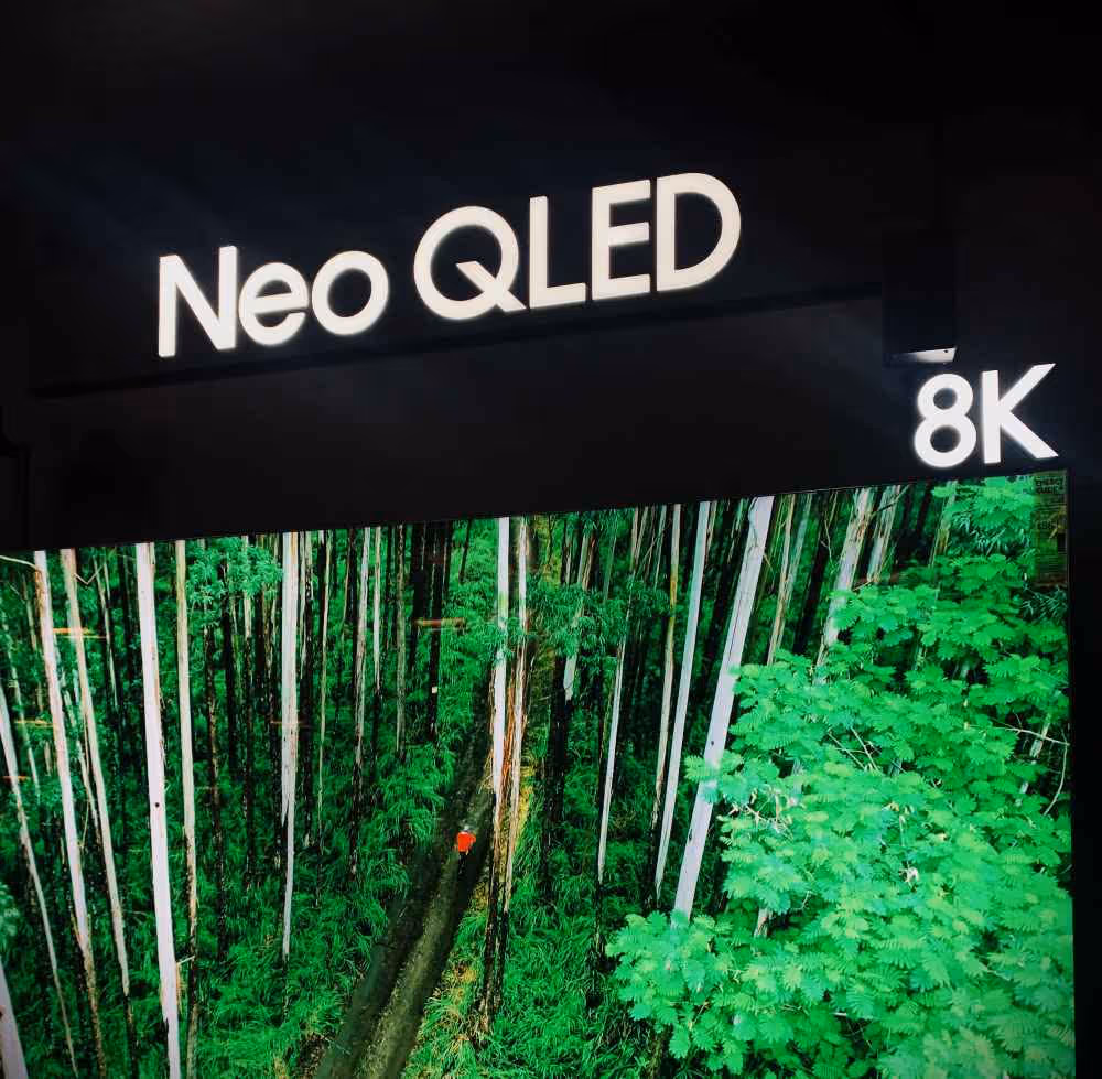 Illuminated push-through letters of Neo QLED in a big box retail store