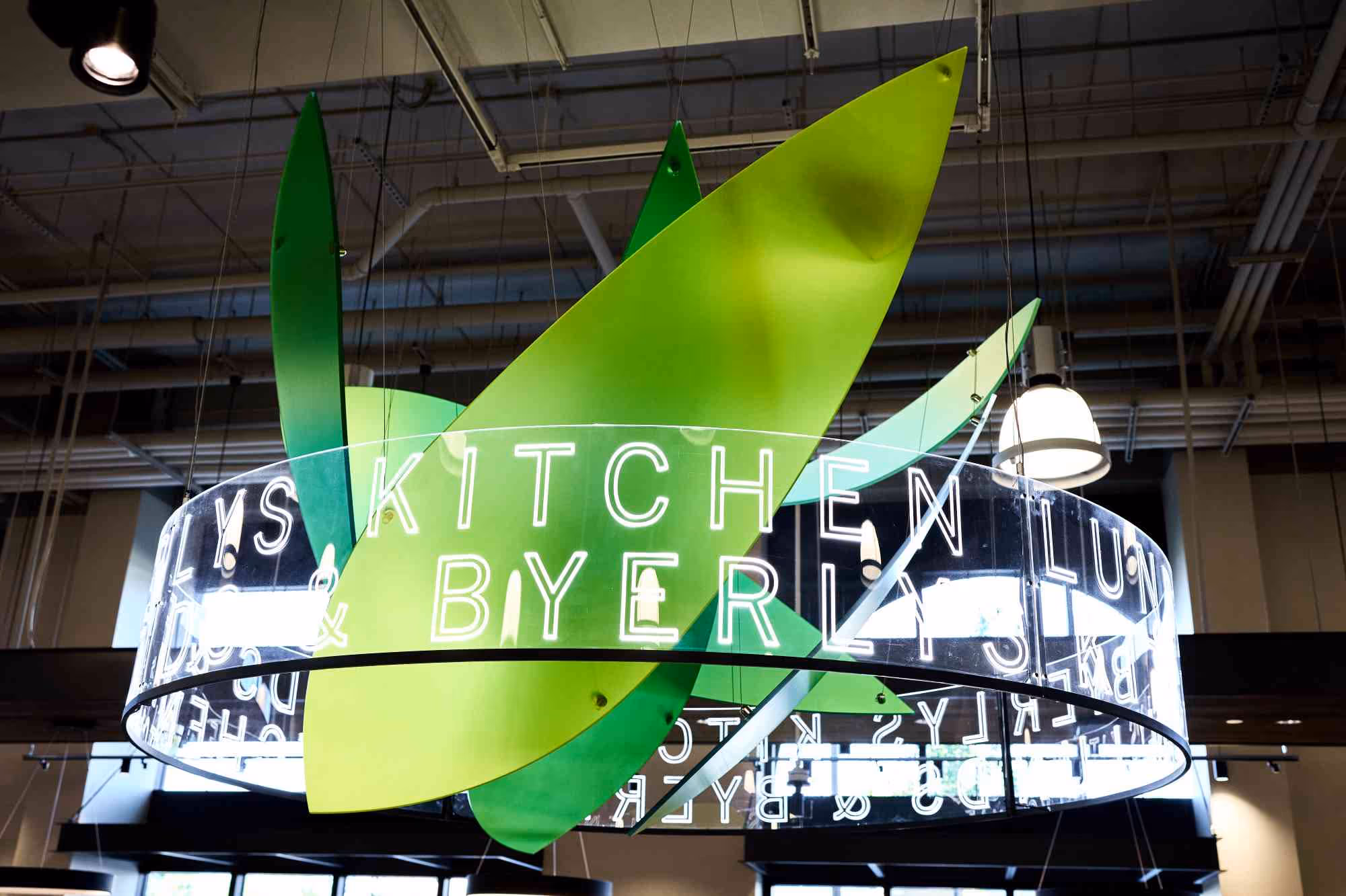 Custom "salad bowl" LED fixture made from recycled acrylic for a grocery store