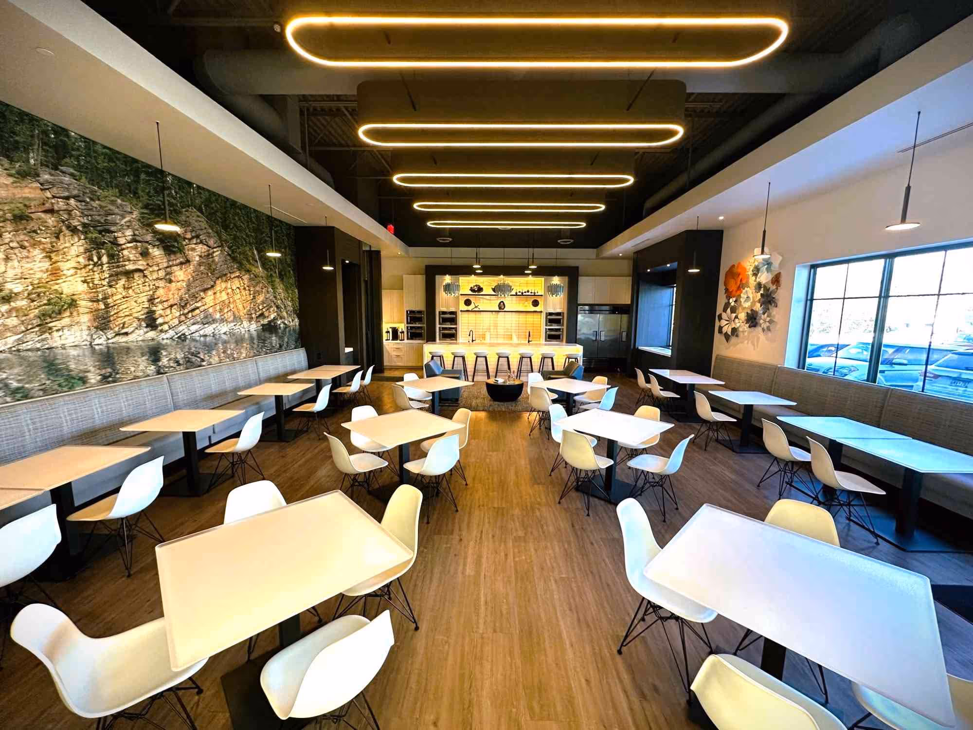Wide angle view of a break room using recycled acrylic and other sustainable materials