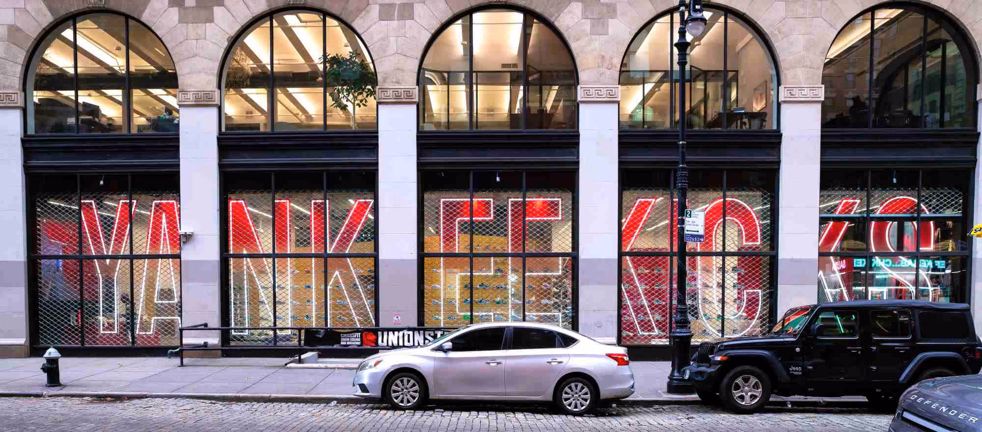 YankeeKicks store exterior with large LED letters sign