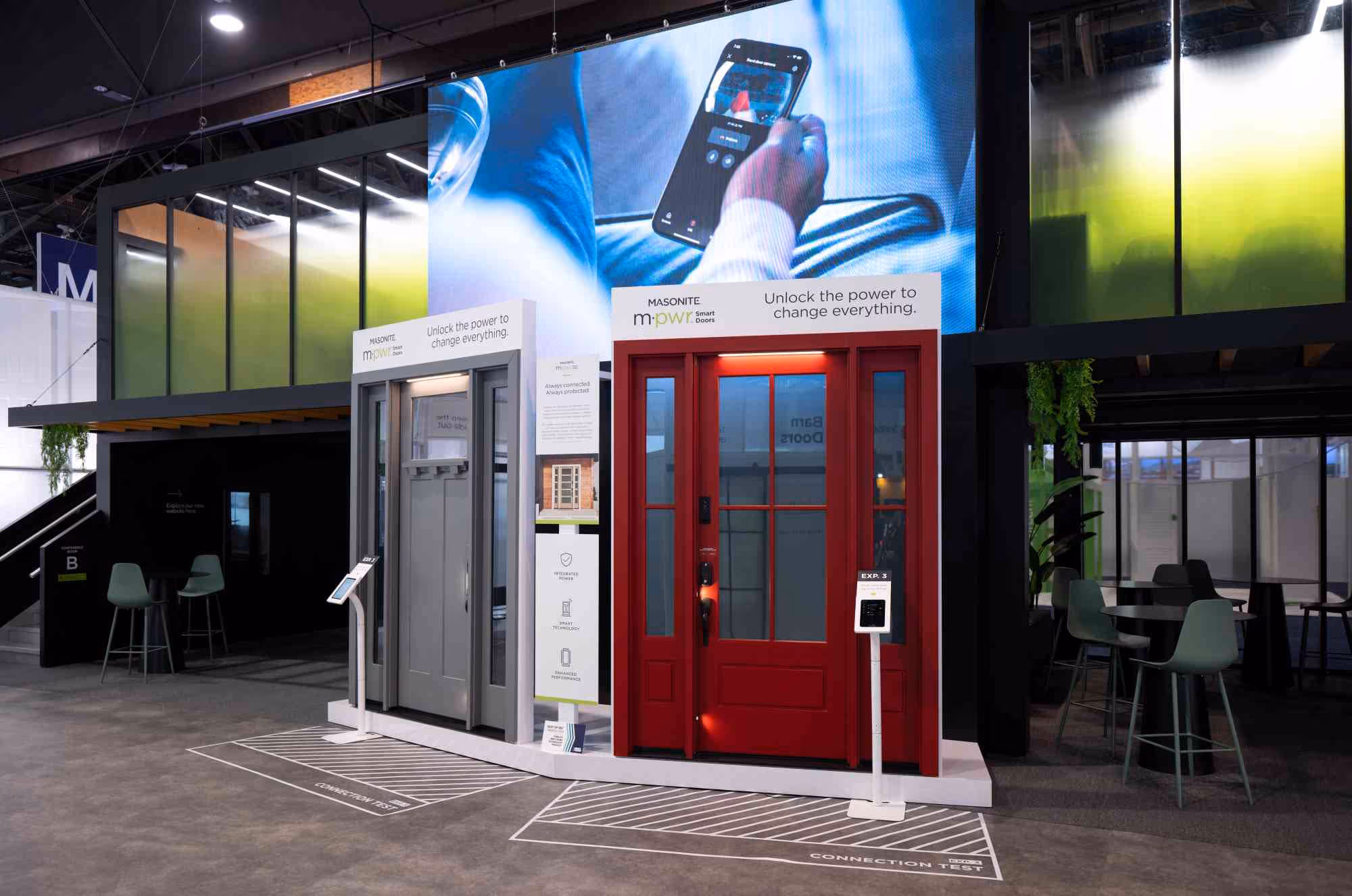 Large trade show booth entrance with recycled acrylic wall panels