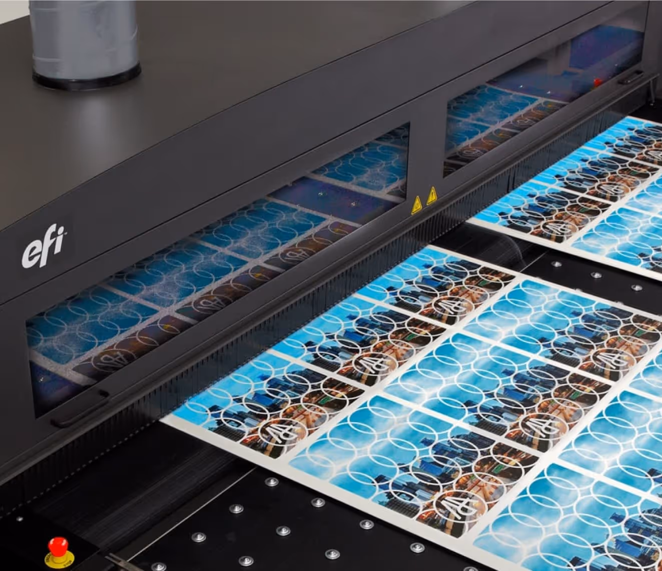 An acrylic sheet coming out of a digital printer