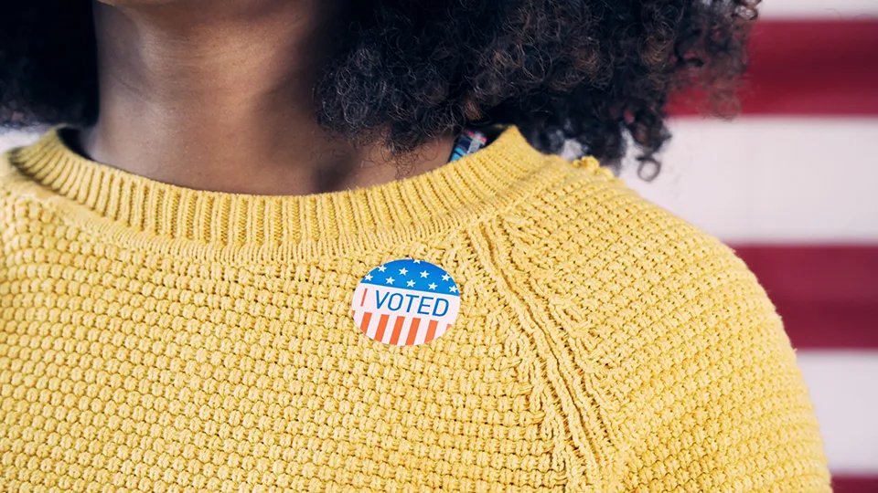Woman with I voted sticker