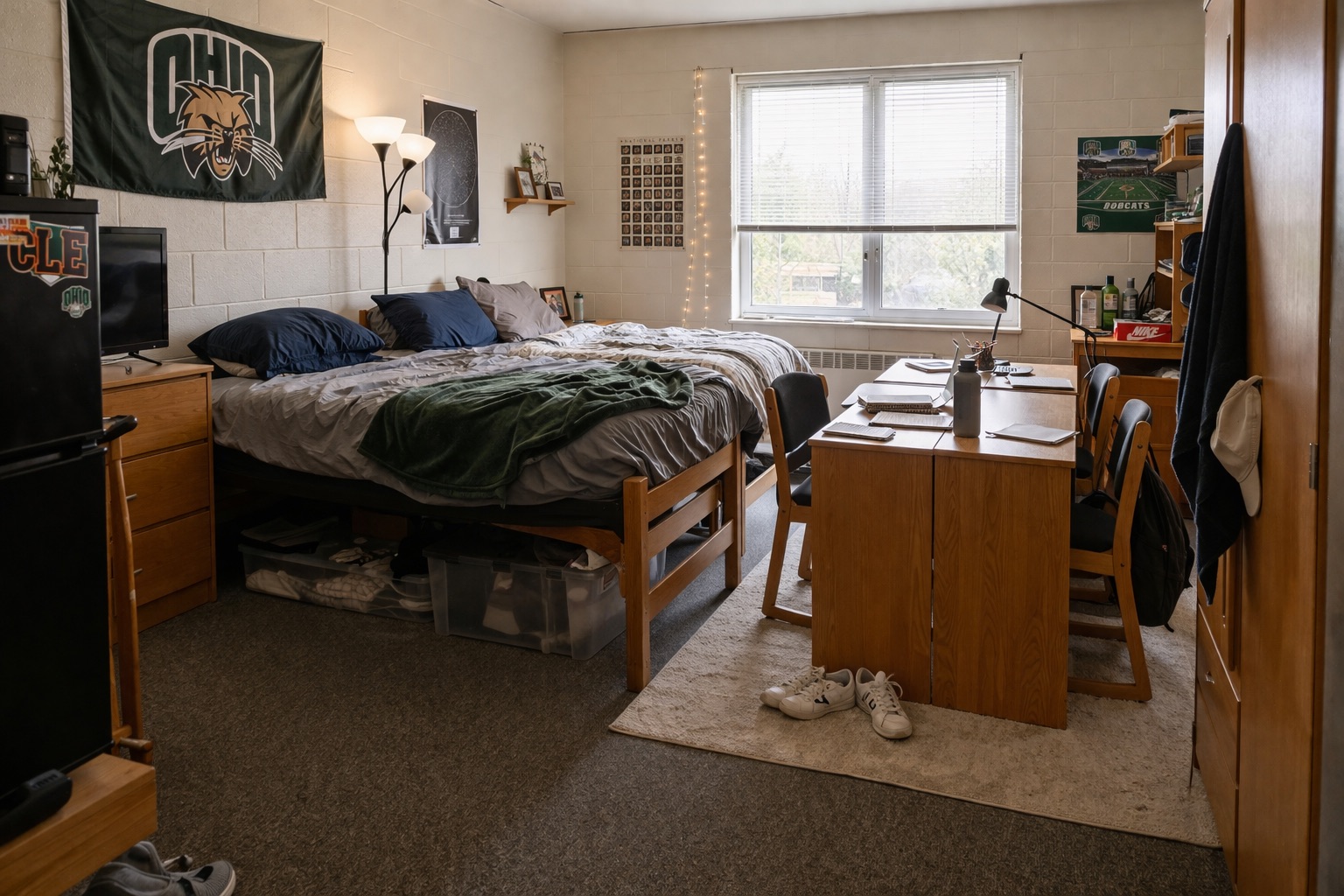 Student cleaning dorm room during move-out week