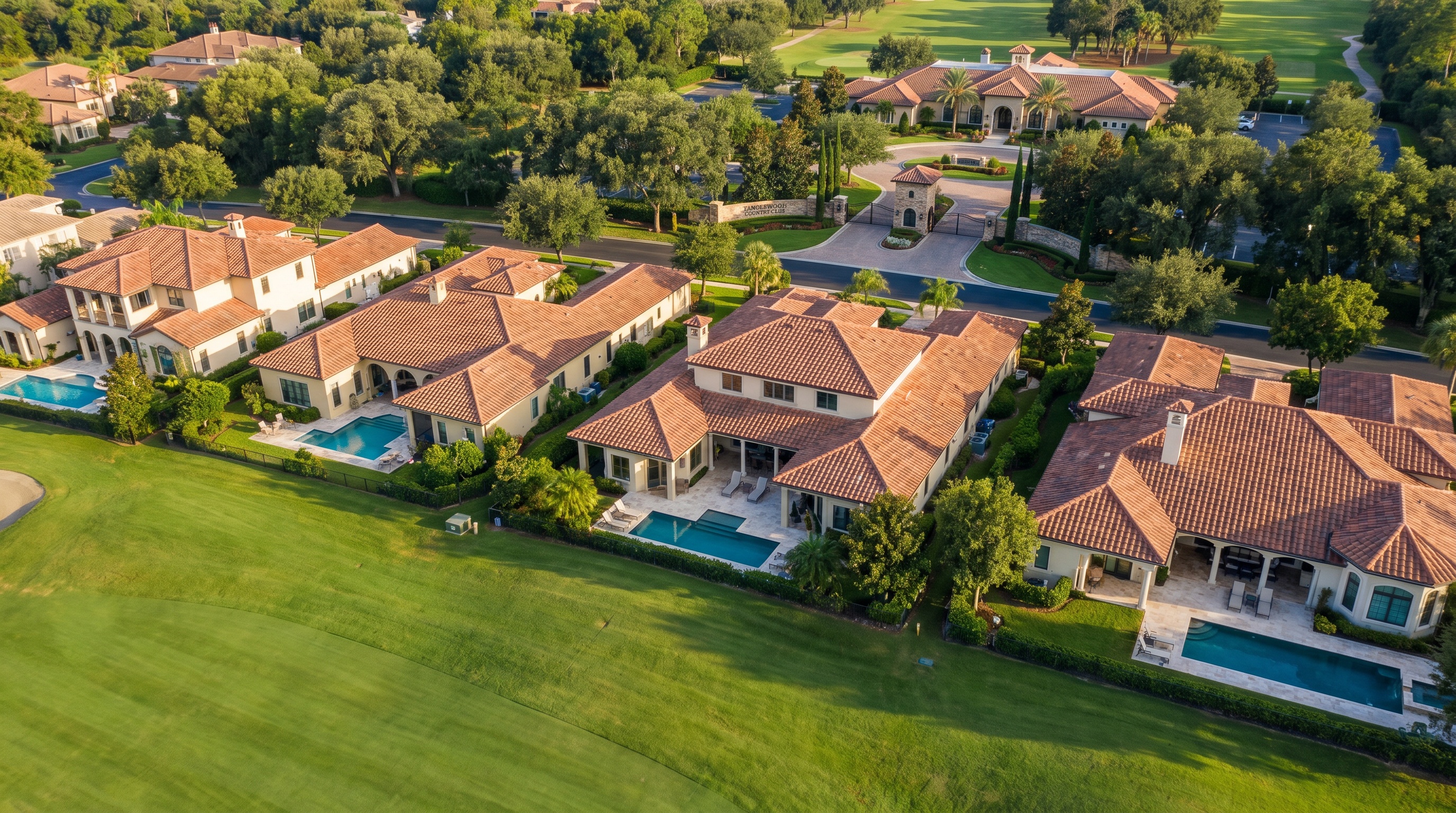 Luxury homes in Tanglewood with golf course views and country club entrance