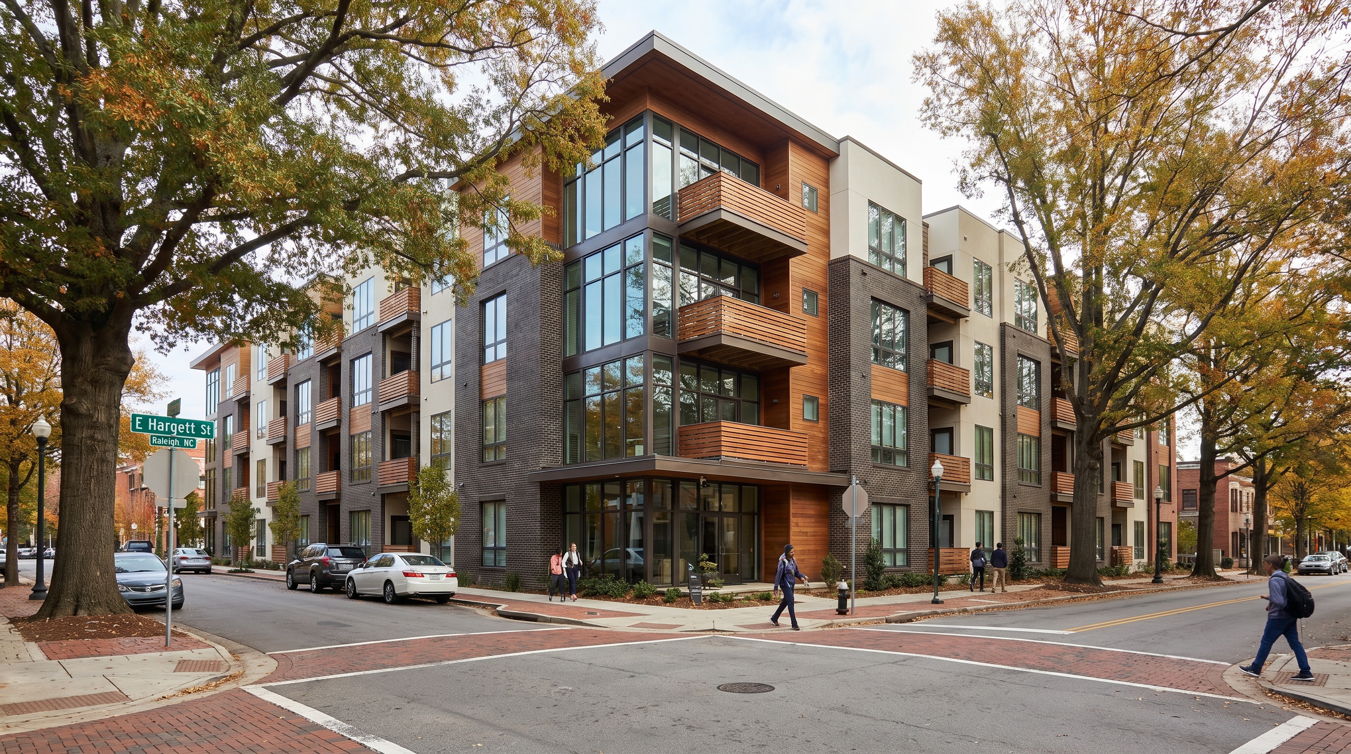 Modern apartment building with tree-lined street in North Carolina
