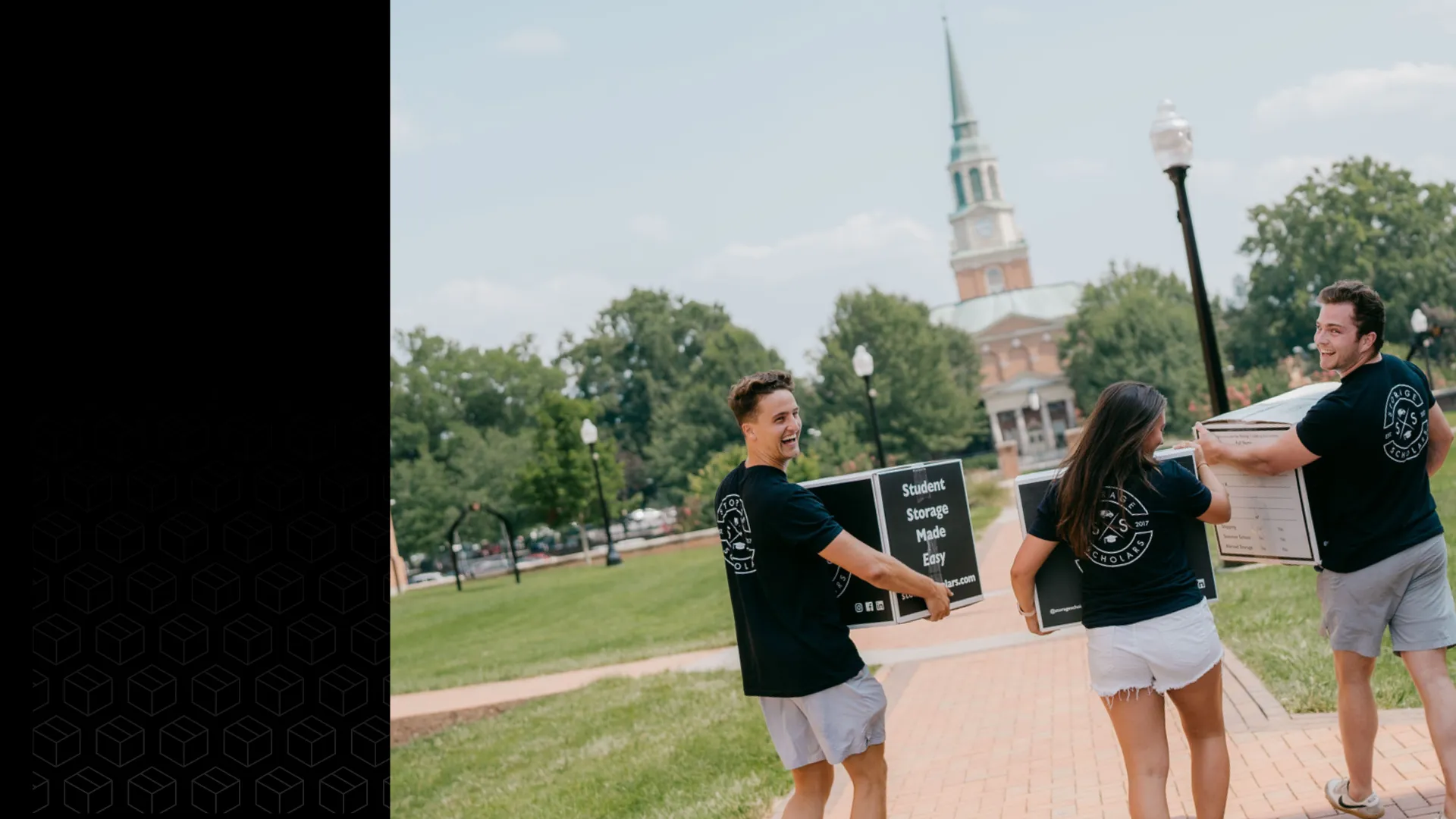 Storage Scholars student crew carrying branded boxes across campus