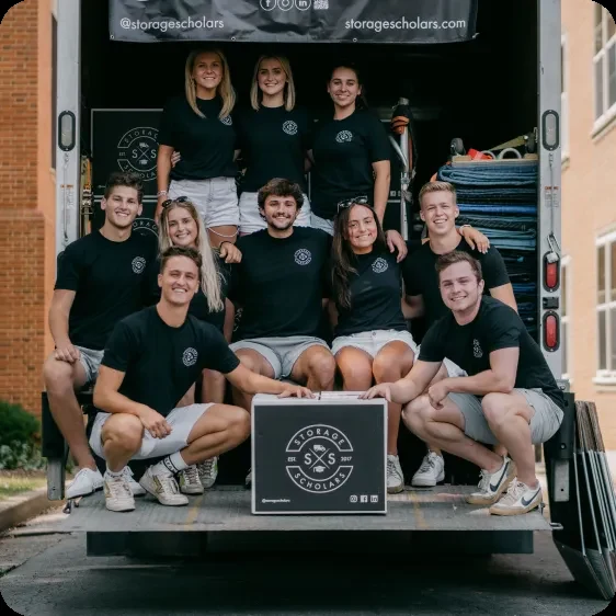 A Storage Scholars student crew loading a truck on move-out day