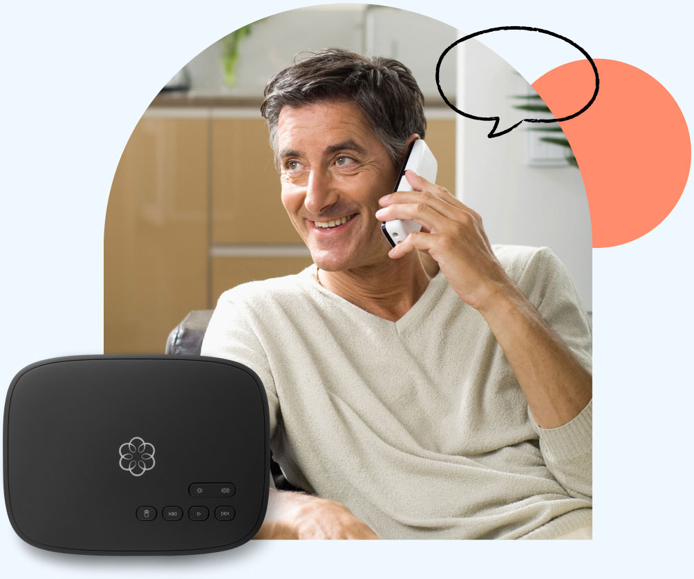 Older man speaking on cordless phone with Ooma Telo device in foreground