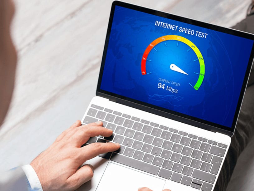 Person doing internet speed test on a laptop