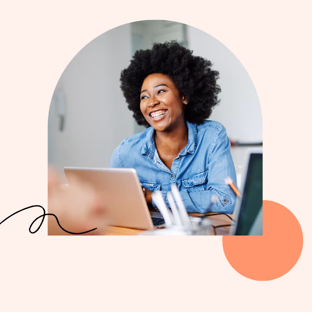 A woman sits on the computer