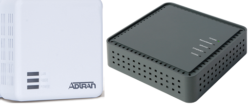 Image of Adtran (medium-sized, white rectangle) and Calix (small, black square) eONTs.