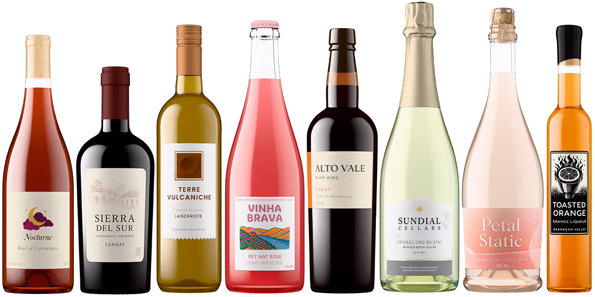 Eight assorted wine bottles including rosé, white, port wine, sparkling, and icewine, arranged in a row.