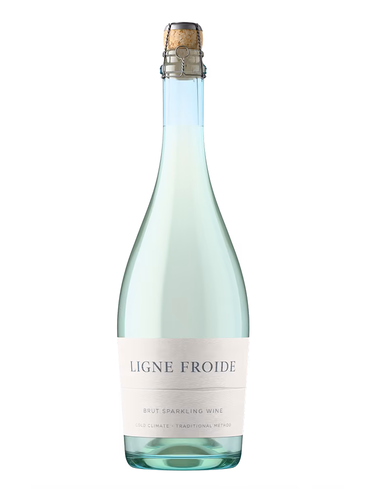 Bottle of Ligne Froide brut sparkling wine with a cork and wire cage closure.