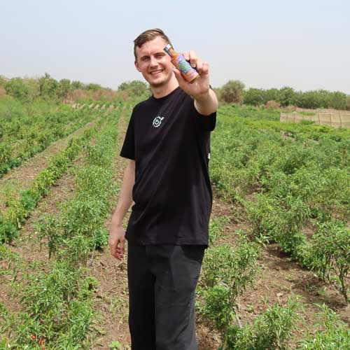 Moritz Eveding auf der Bühne bei einem Vortrag zu SOCHILI und skalierbarem Impact