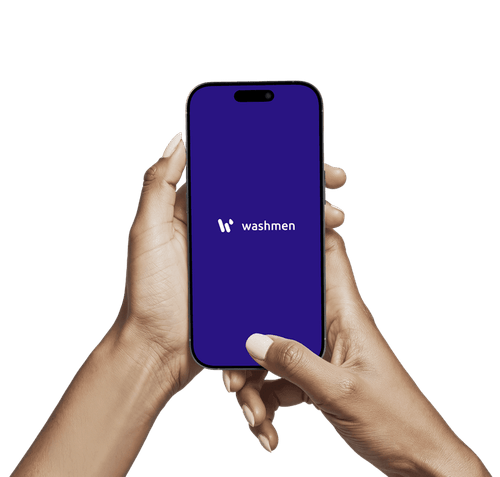 Hands holding a smartphone displaying the Washmen logo on a purple screen.