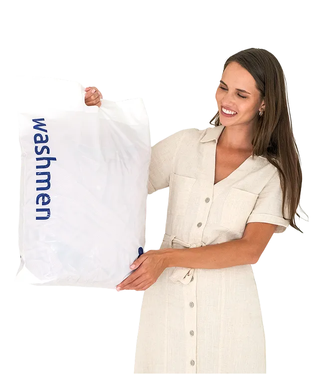 a woman holding a white bag