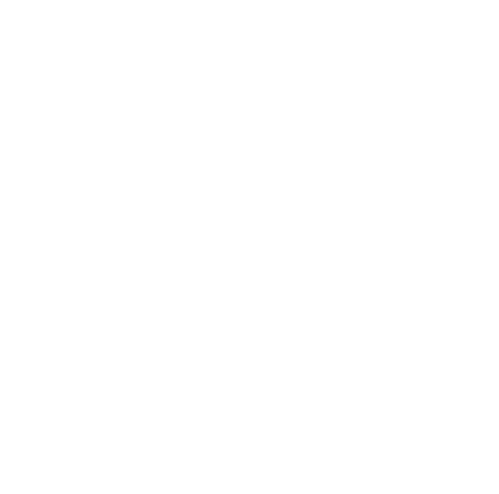 Modern studio setup with gray armchairs, a white pillow, a microphone, decorative vases on a white console, a patterned rug, and a TV screen displaying 'nextspace' logo.