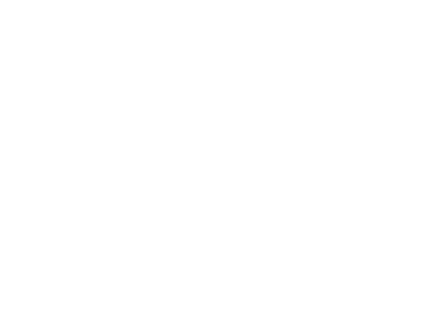 Icon of three people sitting around a table, representing a meeting or discussion.