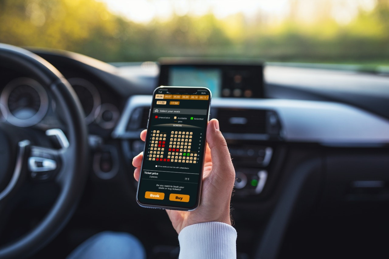 Booking movie tickets in the car