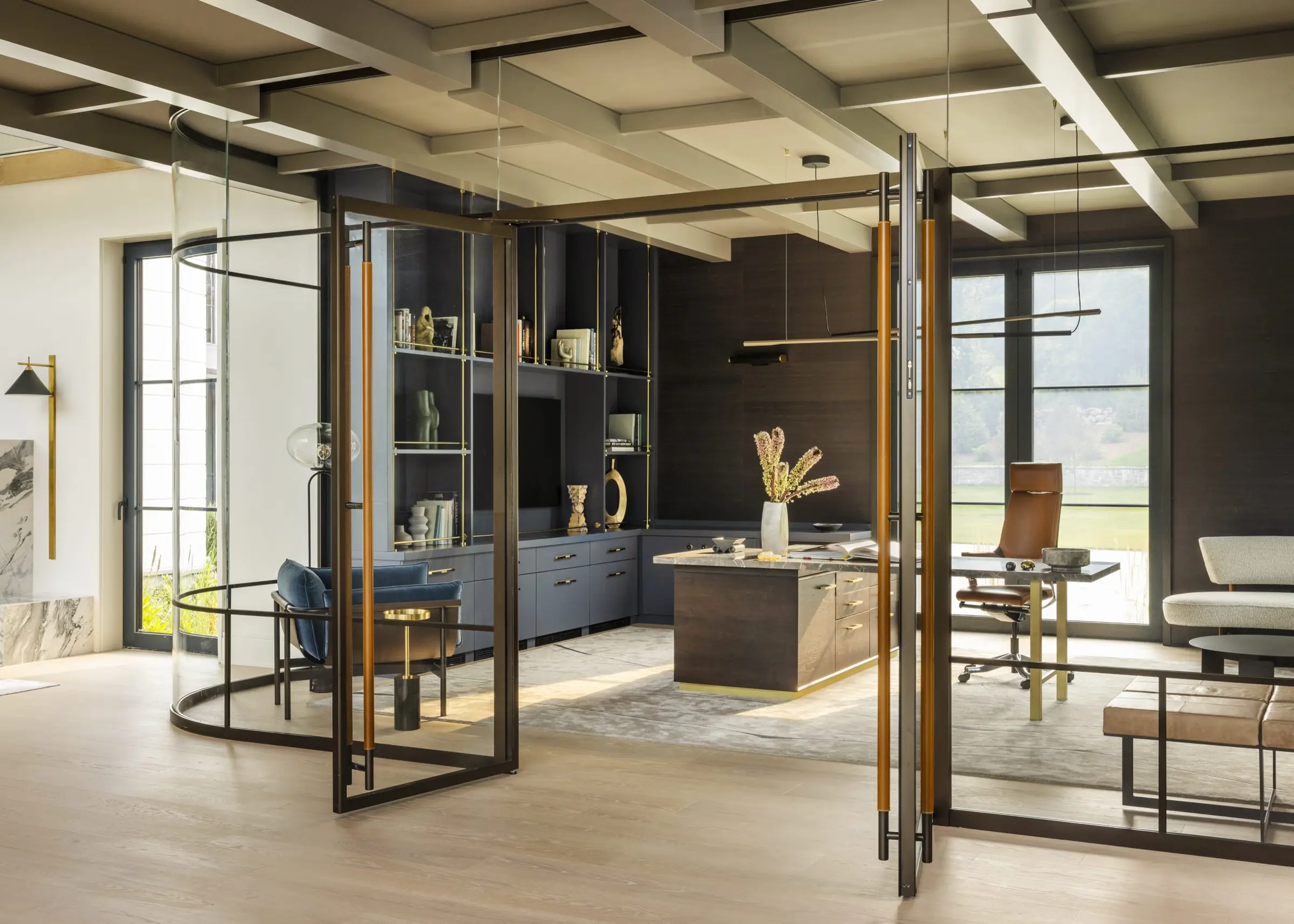 Home office with custom metal-framed room dividers