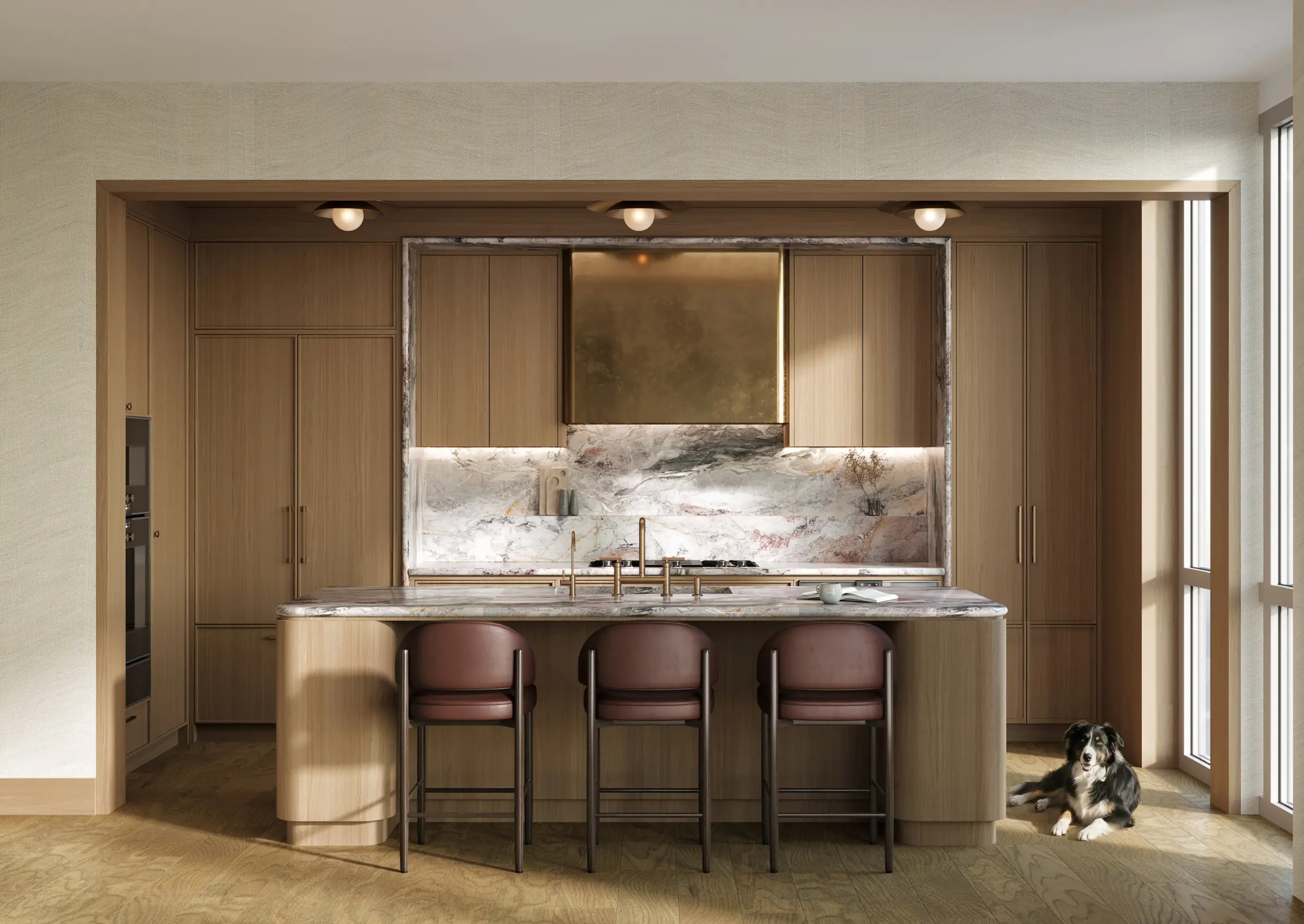 Kitchen with marble slab backsplash, wood cabinetry, and waterfall island