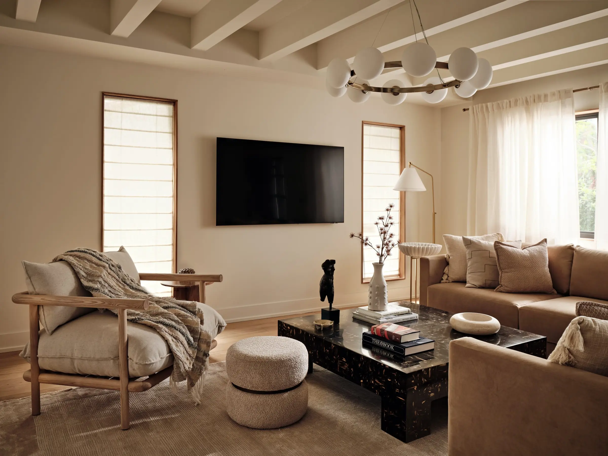 Living room with ceiling opened to the original beams, in Karen Asprea's own Miami home