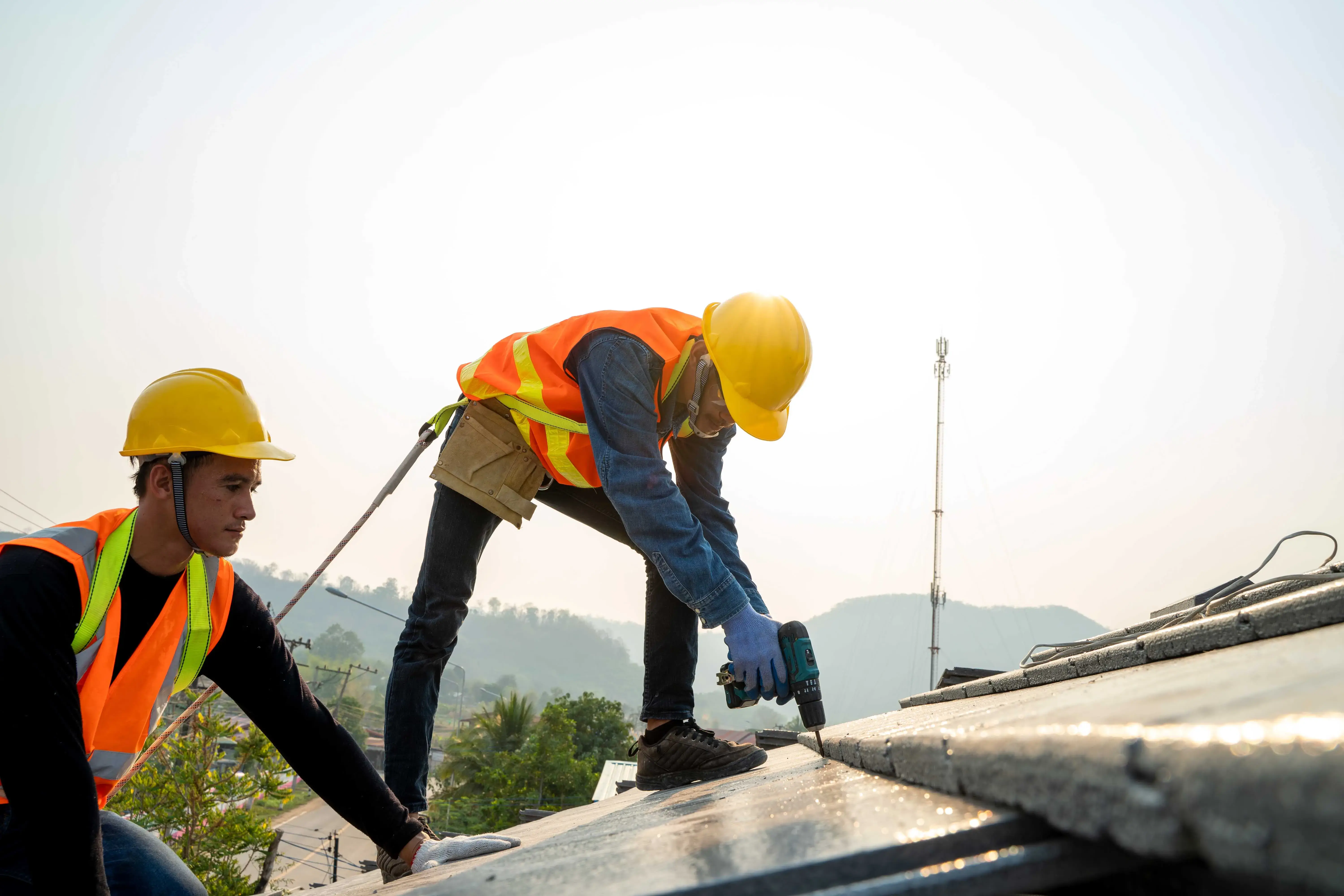 Technicians working at the roof