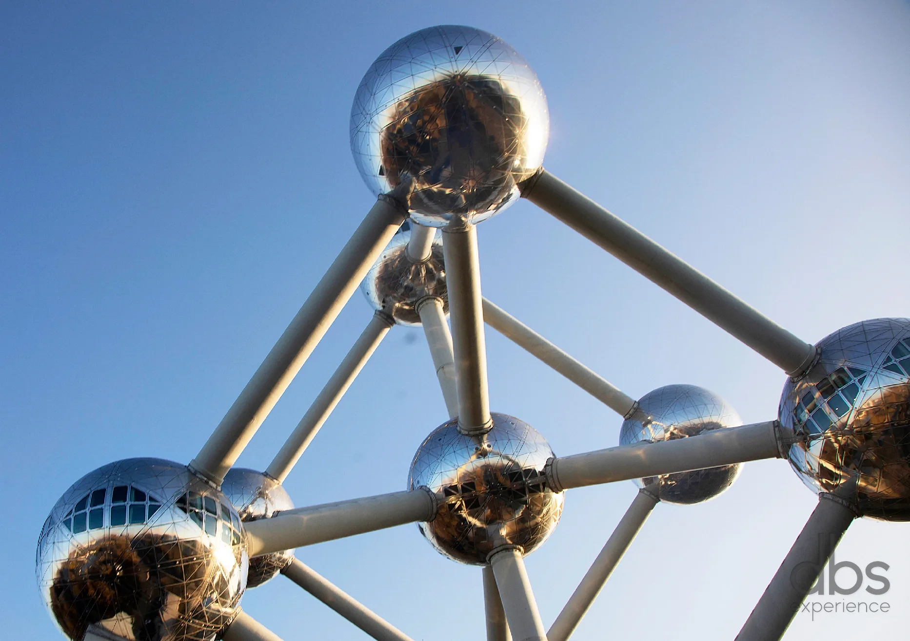 Steel spheres of the Atomium in Brussels against a clear blue sky