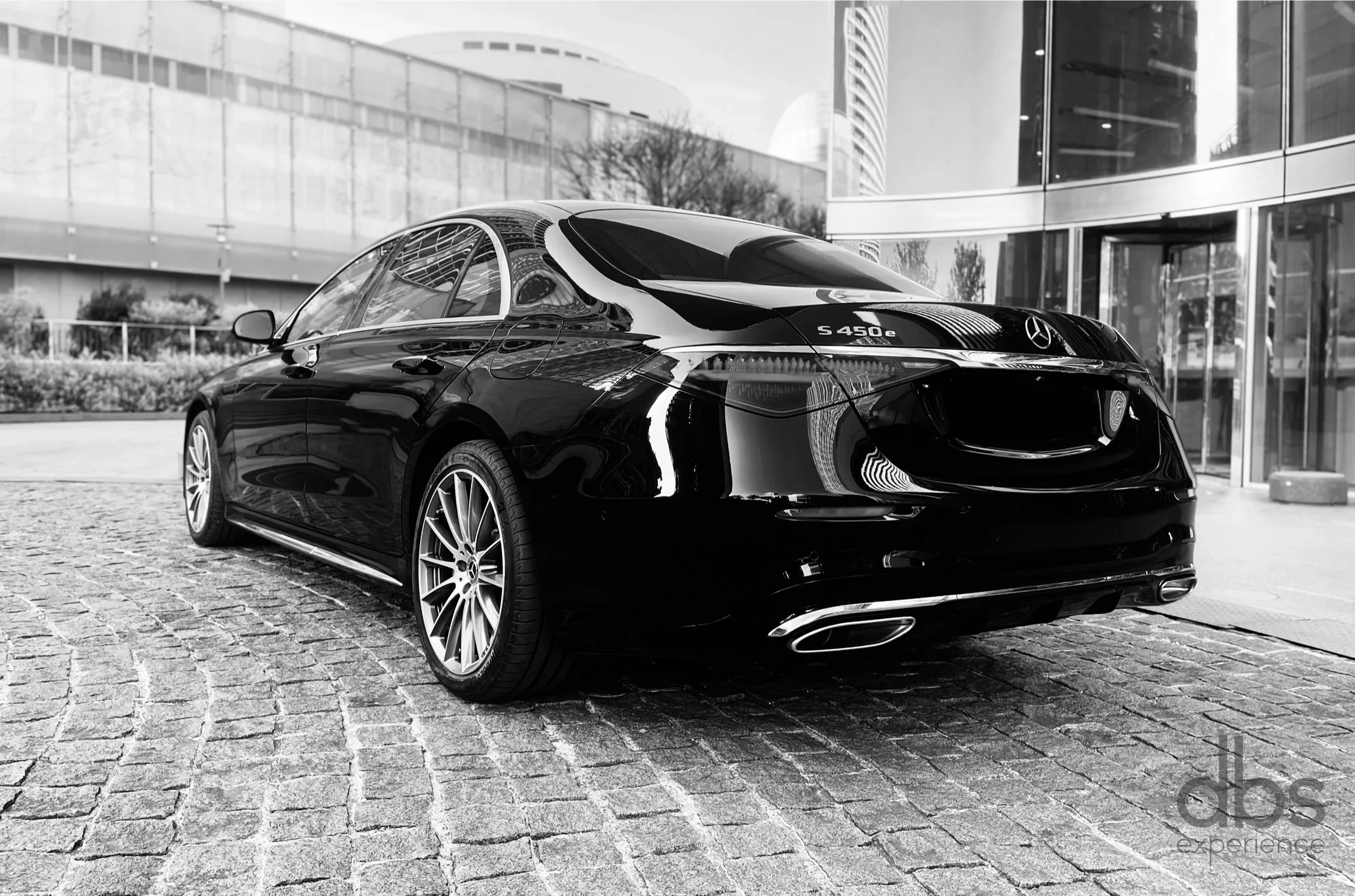 A chauffeur-driven Luxury Sedan on a Paris roadshow
