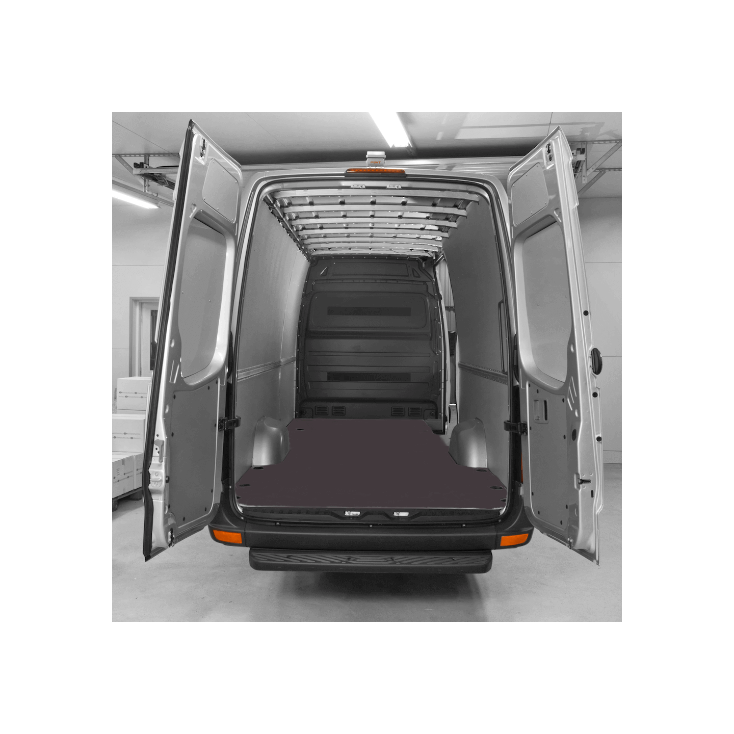 The load bay of the DBS EXPERIENCE cargo van, rear doors open