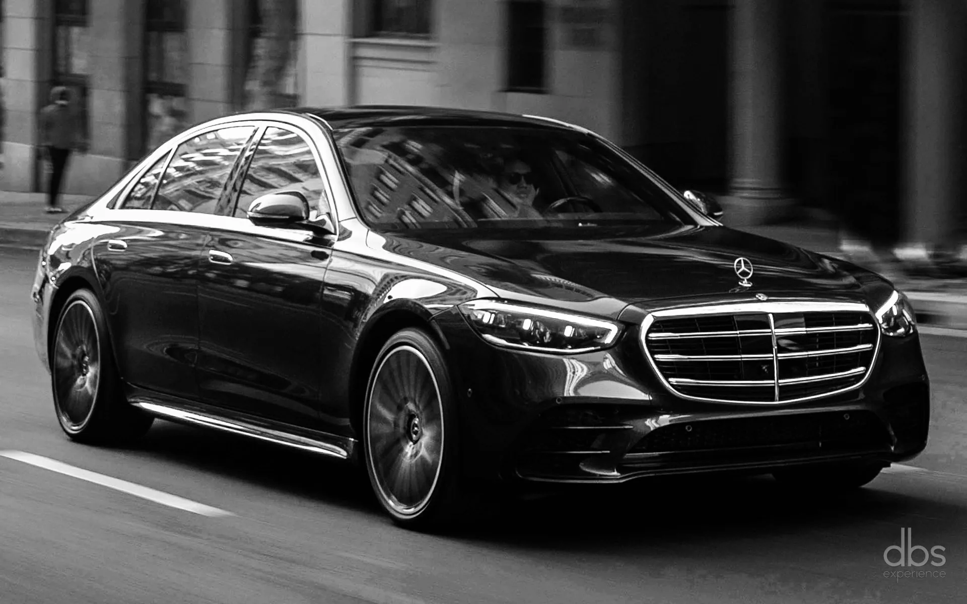 A DBS EXPERIENCE Mercedes-Benz S-Class moving through Paris between roadshow meetings