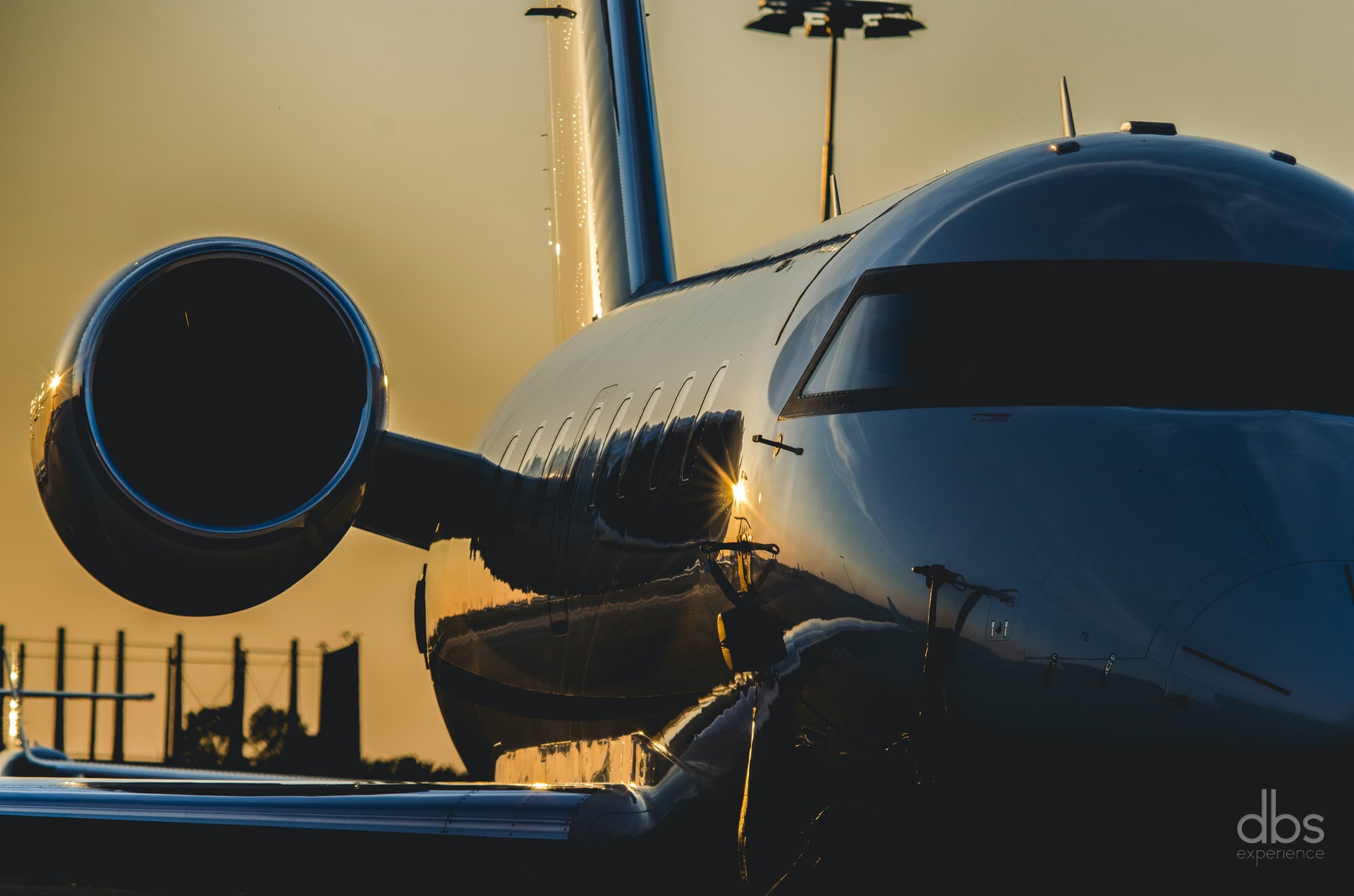 Business jet on the apron at sunset at a Paris business aviation airport