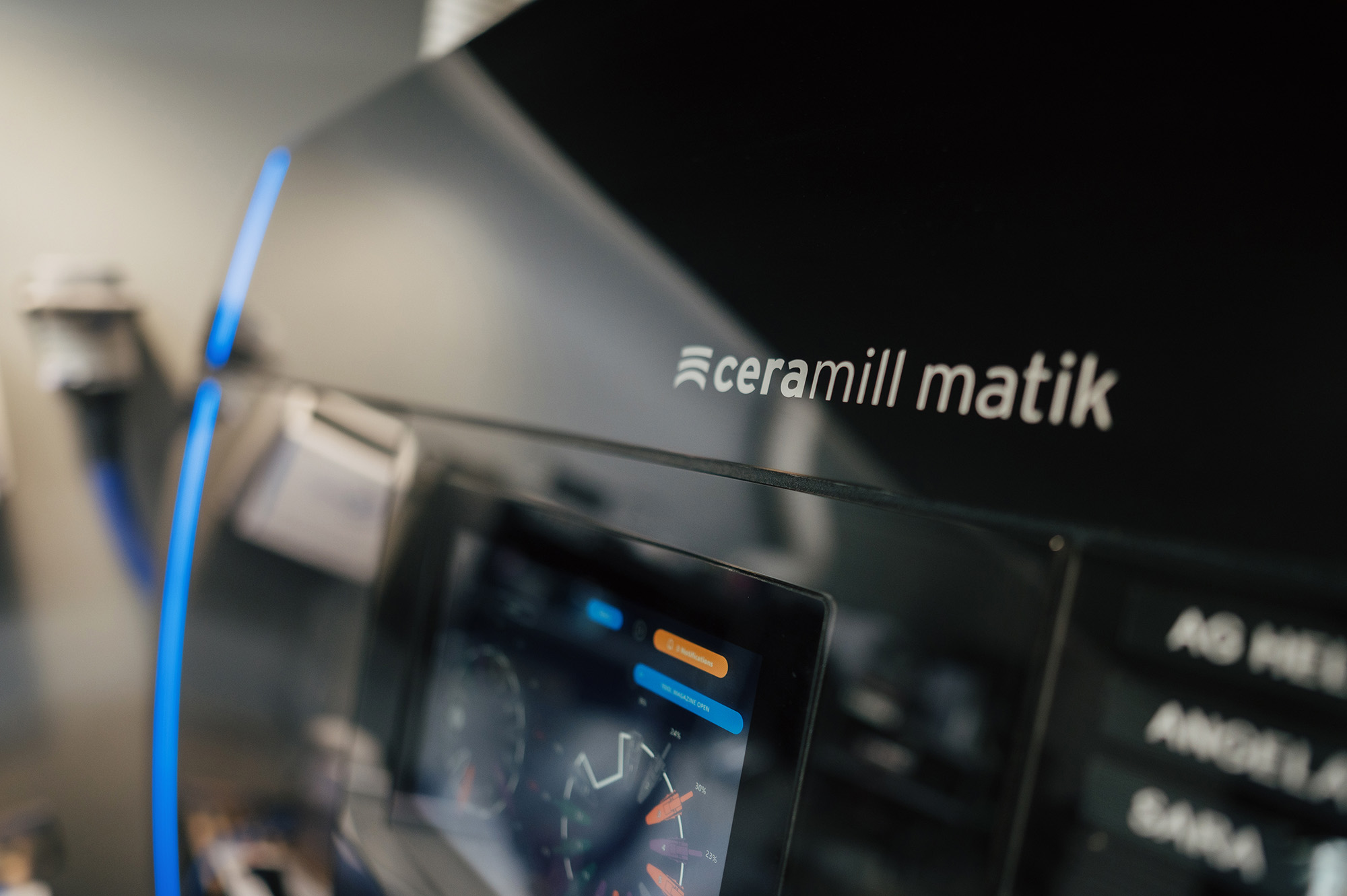 Close-up of a Ceramill Matik dental milling machine, showing its logo and part of the control panel display—an essential tool for any dentist seeking precision and efficiency in dental restorations.
