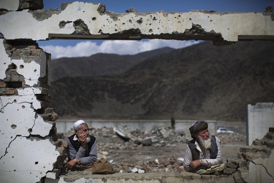 Afghan villagers flee their homes, blame US drones