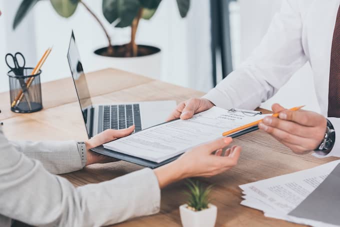 Real Estate concept of landlord giving tenant compensation form becasue the landlord is required to fix the mold problem in rental unit