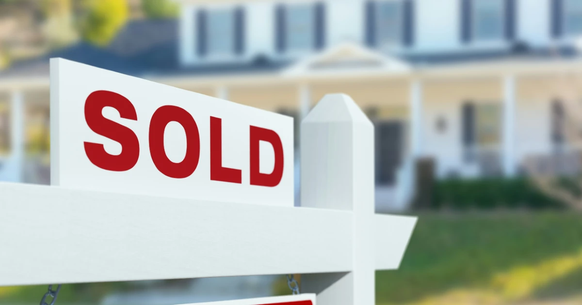 A sold sign on a rental property