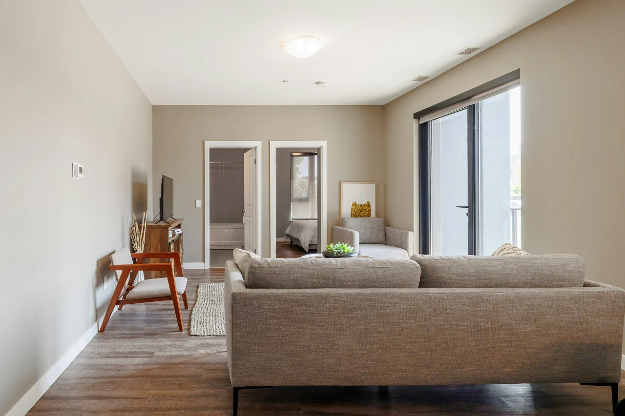 A professionally photographed living room interior of a rental property