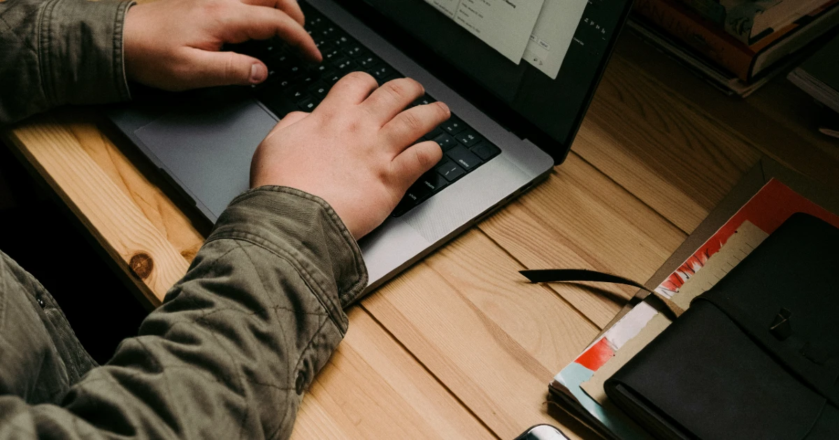 A man does due diligence on a laptop