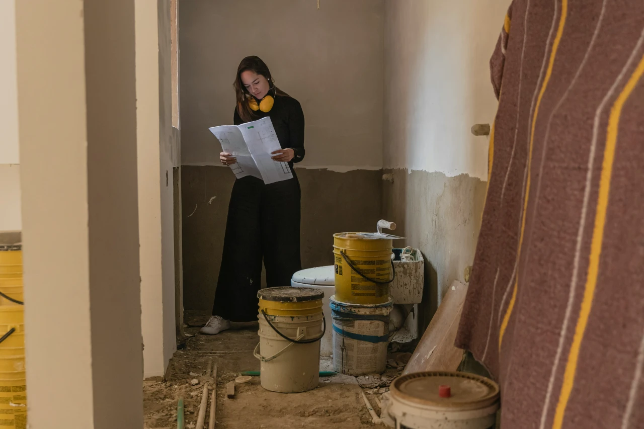 A woman does due diligence by inspecting a rental property