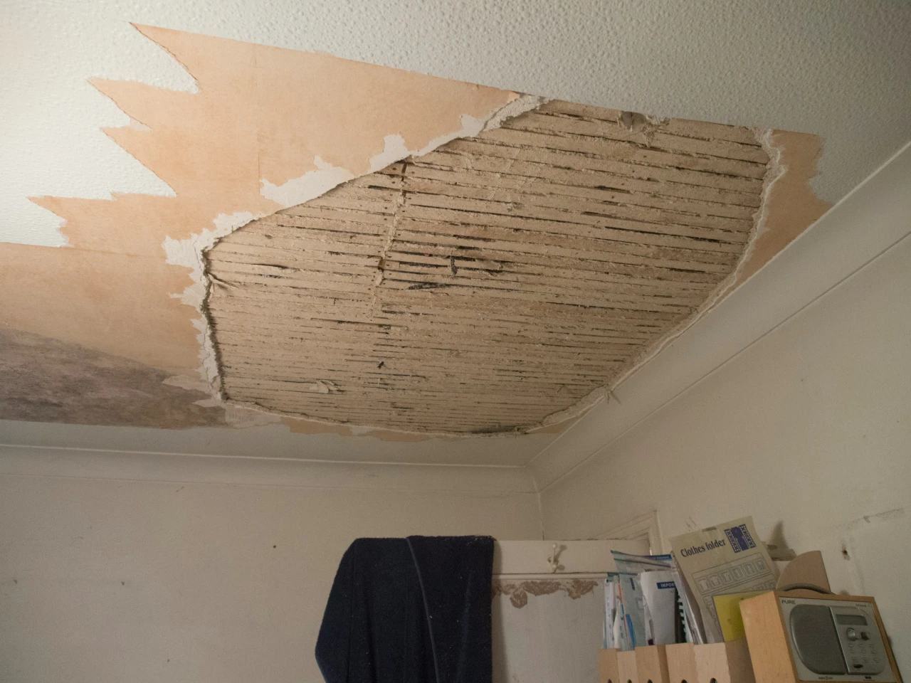 A hole in the roof of a rental property