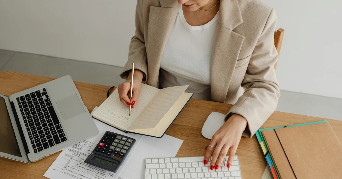 A woman does her taxes