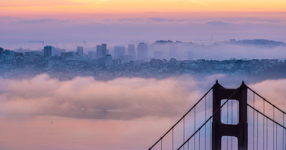 The San Francisco Bay Area in the background behind the Golden Gate Bridge