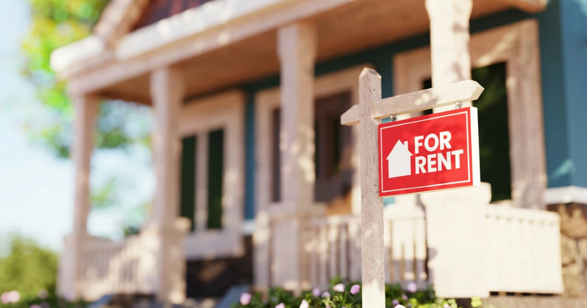 A home with a 'for rent' sign