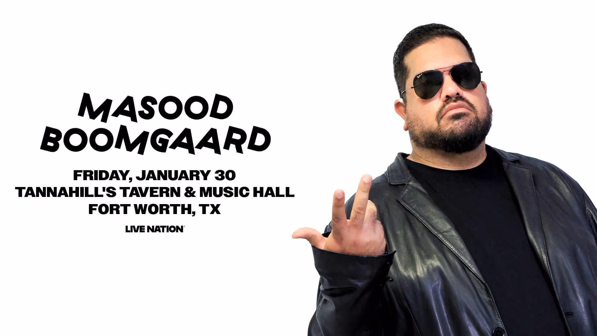 Masood Boomgaard wearing sunglasses and a black leather jacket posing with a hand gesture for event at Tannahill's Tavern & Music Hall, Fort Worth, TX.
