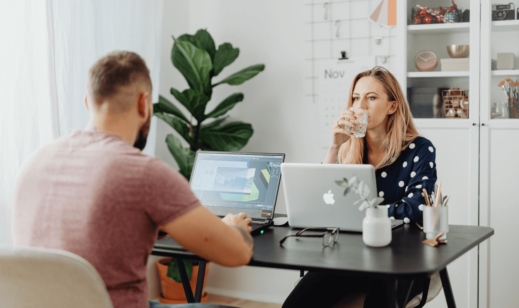 man and woman in an office